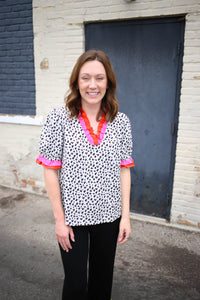 Animal print with pink and orange ruffle hem short sleeve top