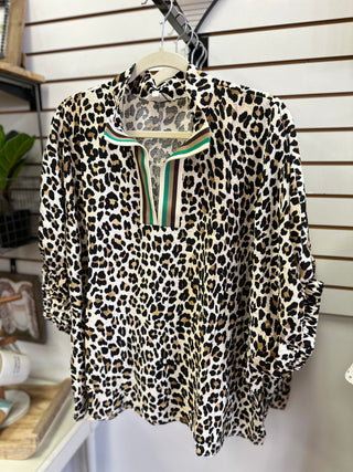 Leopard print top with green brown white and taupe stripe neckline detail