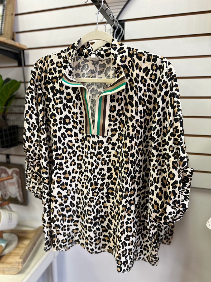 Leopard print top with green brown white and taupe stripe neckline detail
