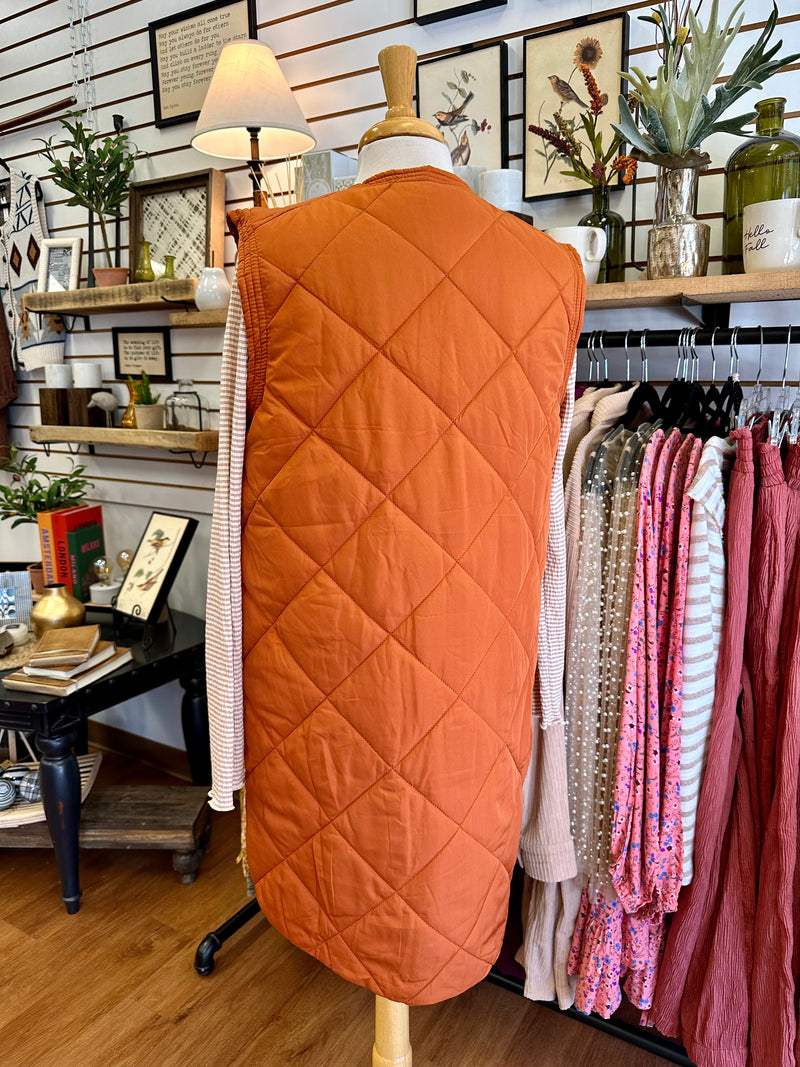staccato copper quilted long vest