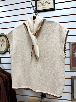 Oatmeal knit sweater with brown crochet hem detail and detachable neck scarf