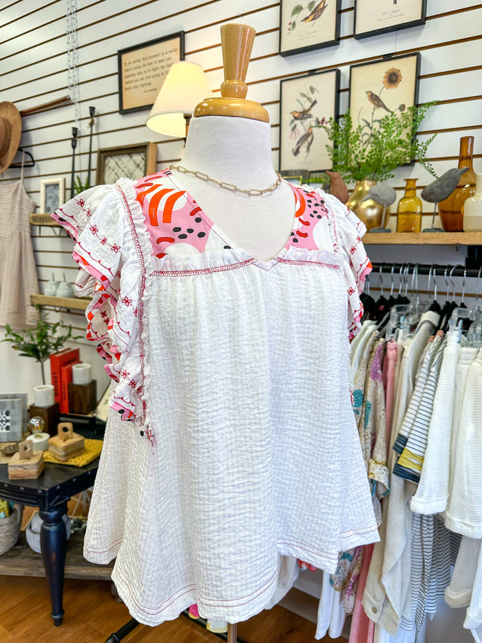 red and pink print mixed embroidery top