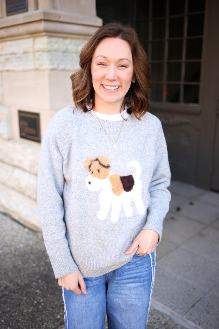heather grey sweater with fuzzy brown black and white dog on the front