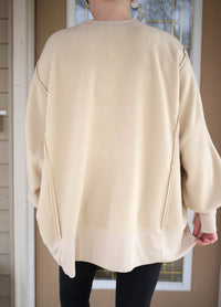 Cozy Fleece Hem Detail Cream Sweatshirt | Boutique Elise Hyfve