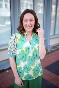 Green and blue floral print blouse with mixed print short sleeves