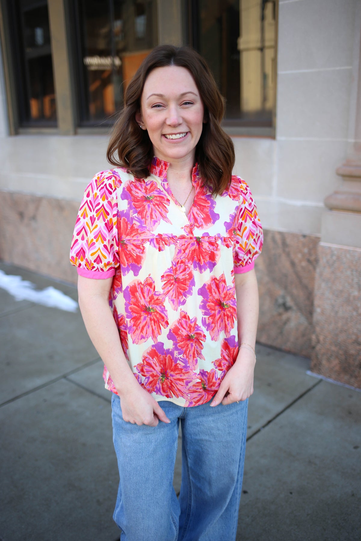 pink floral print blouse with mixed print short sleeves
