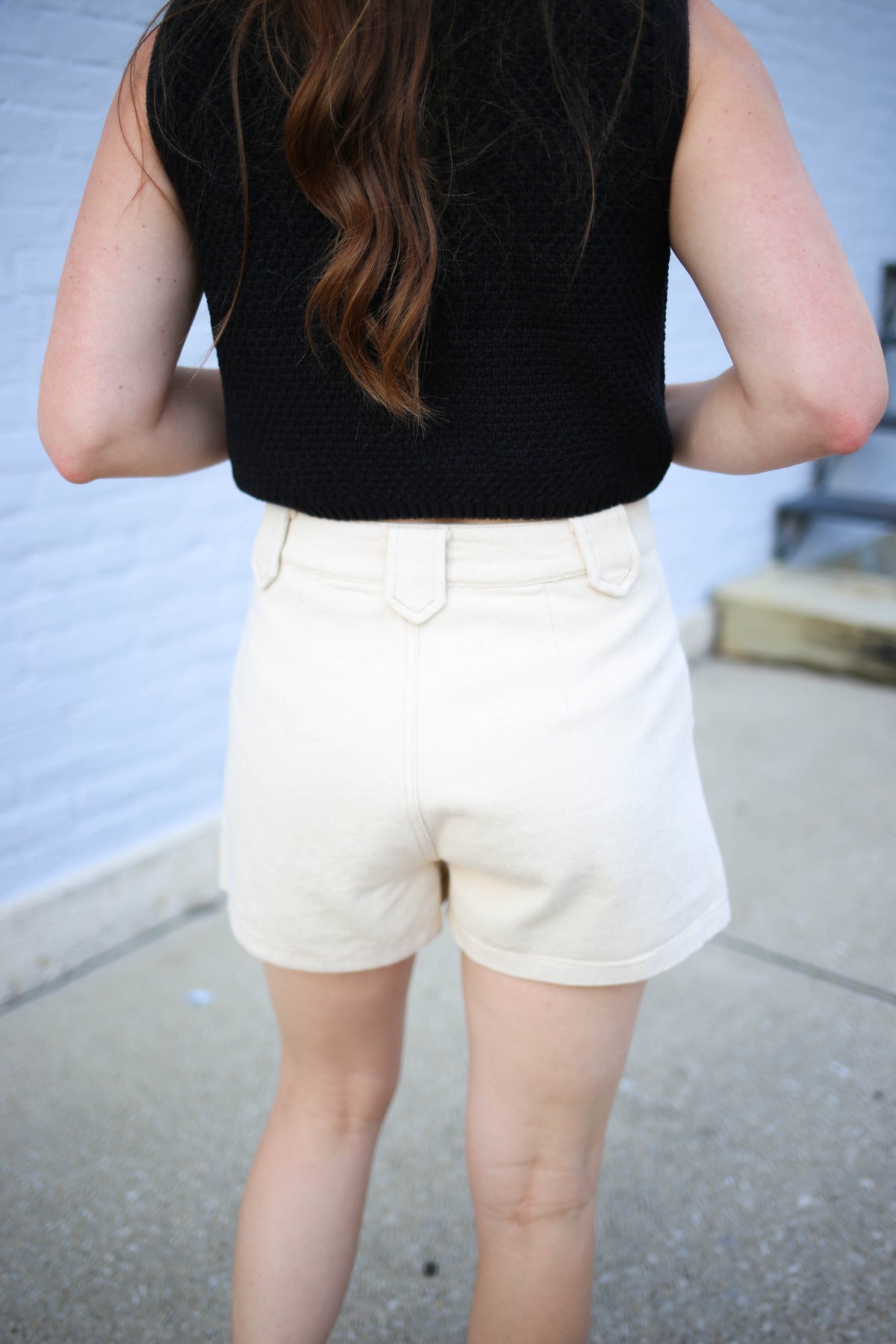 back detail of the off white denim shorts