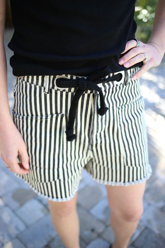 Black and white denim shorts with rope drawstring waist detail
