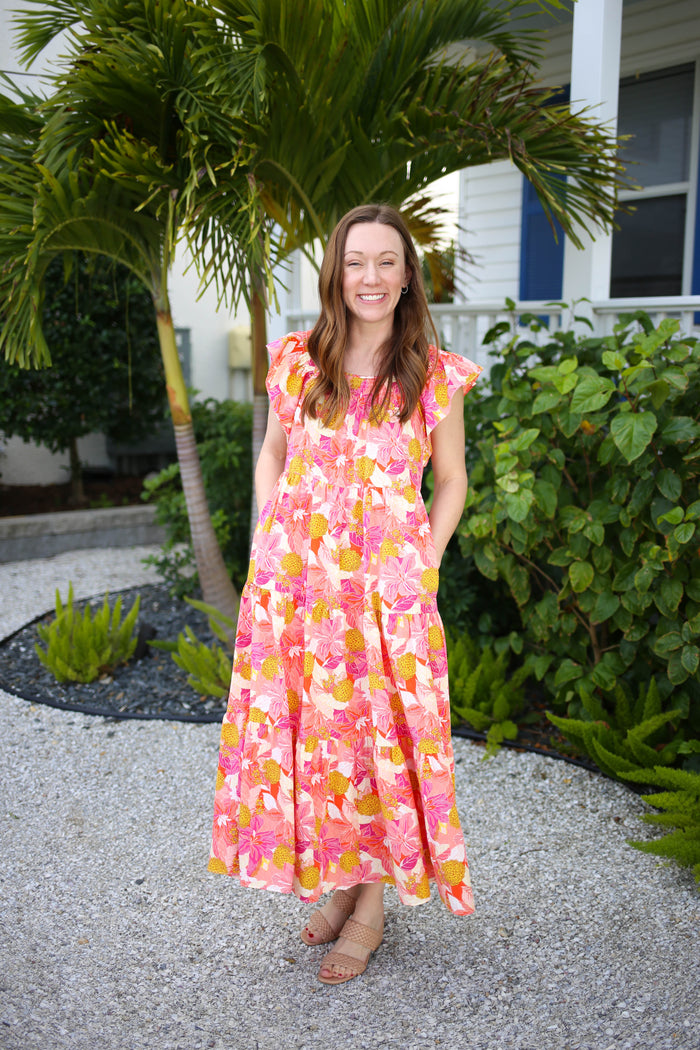 pink and orange printed midi dress