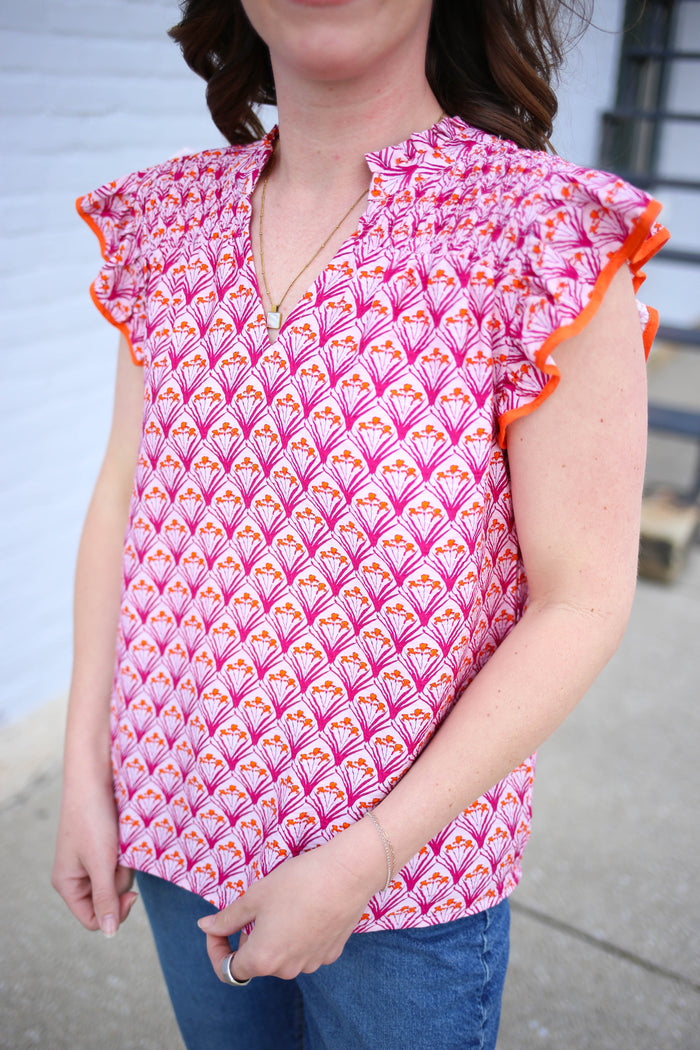 pink and orange print ruffle sleeve detail top 