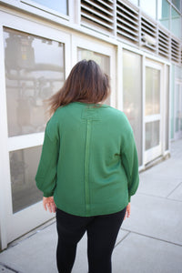 back detail of the hunter green solid crewneck long sleeve