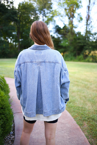 pleat detail of the oversized light denim jacket