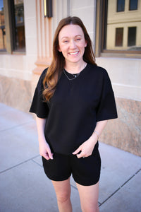 Black short sleeve top and shorts set
Entro