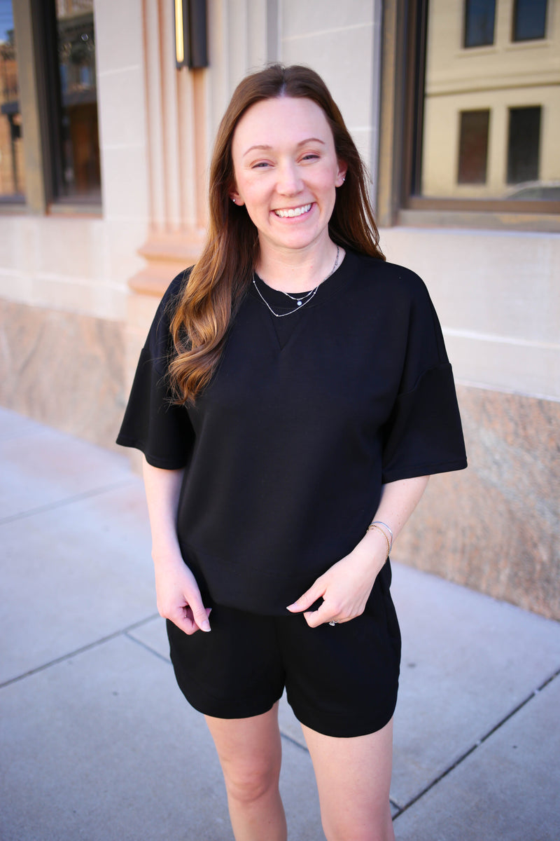 Black short sleeve top and shorts set
Entro