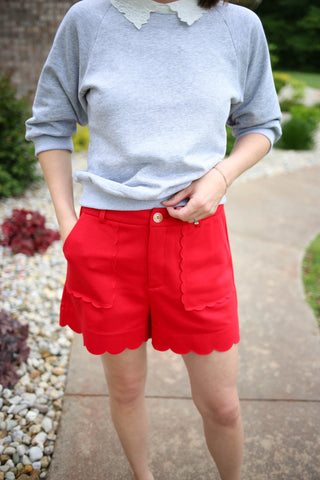 bright red scallop hem shorts