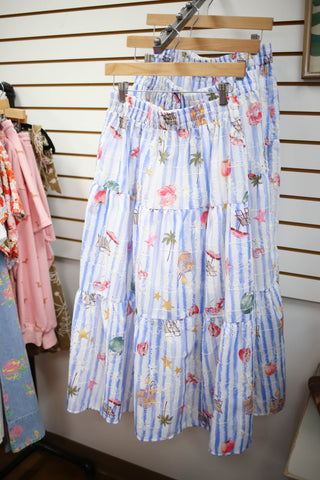 Blue and white stripe tiered midi skirt with colorful summer print