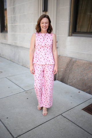 Pink and red sleeveless peplum top
