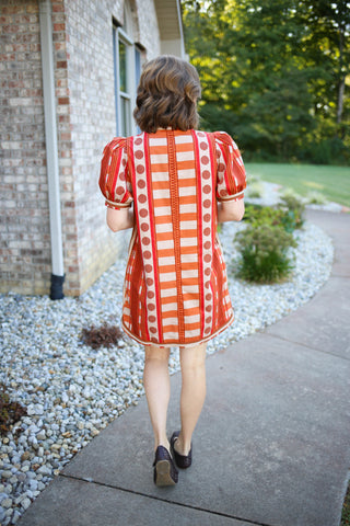 Orange Red and Tan Modern Print Dress | Millie Entro