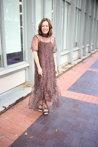 Sheer brown and black leopard print midi dress with solid brown dress lining