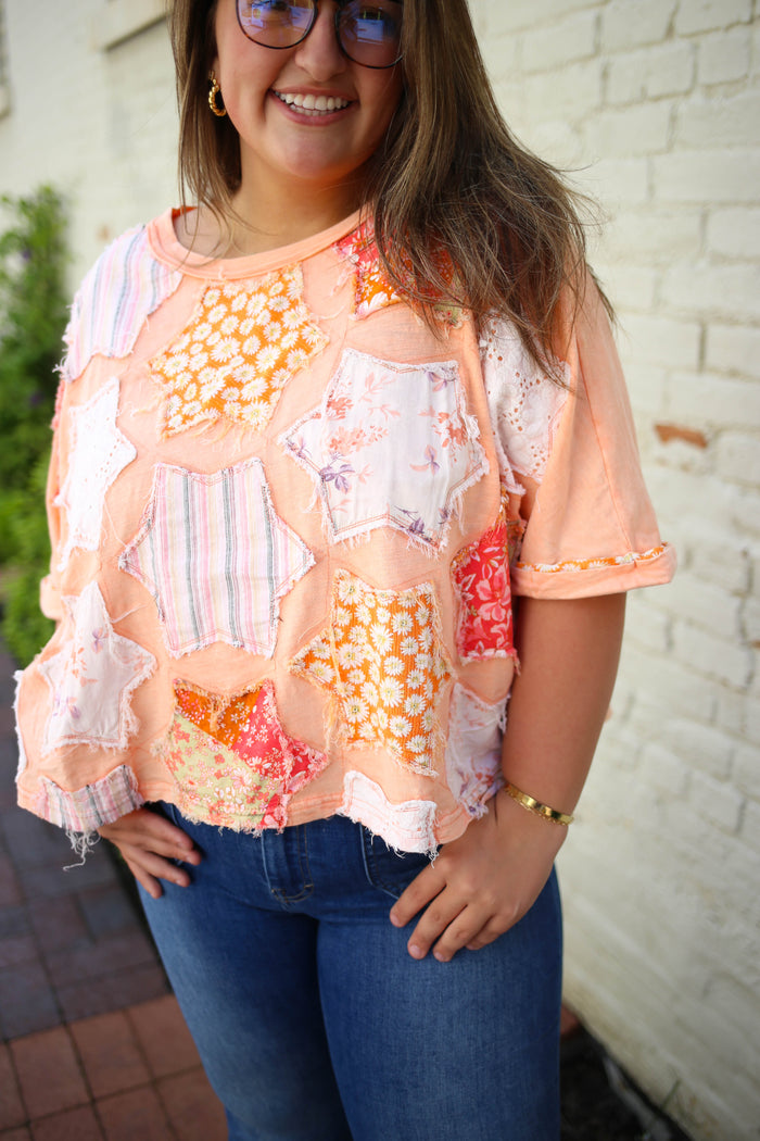 Orange Star Detail Short Sleeve Top | Boutique Elise | Betsey oli hali