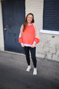 coral and purple colorblock pullover sweatshirt