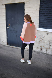 coral and purple colorblock pullover sweatshirt