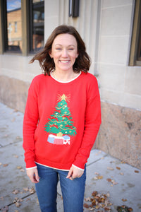 Bright red sweater with a Christmas Tree Presents and Red Bow Details