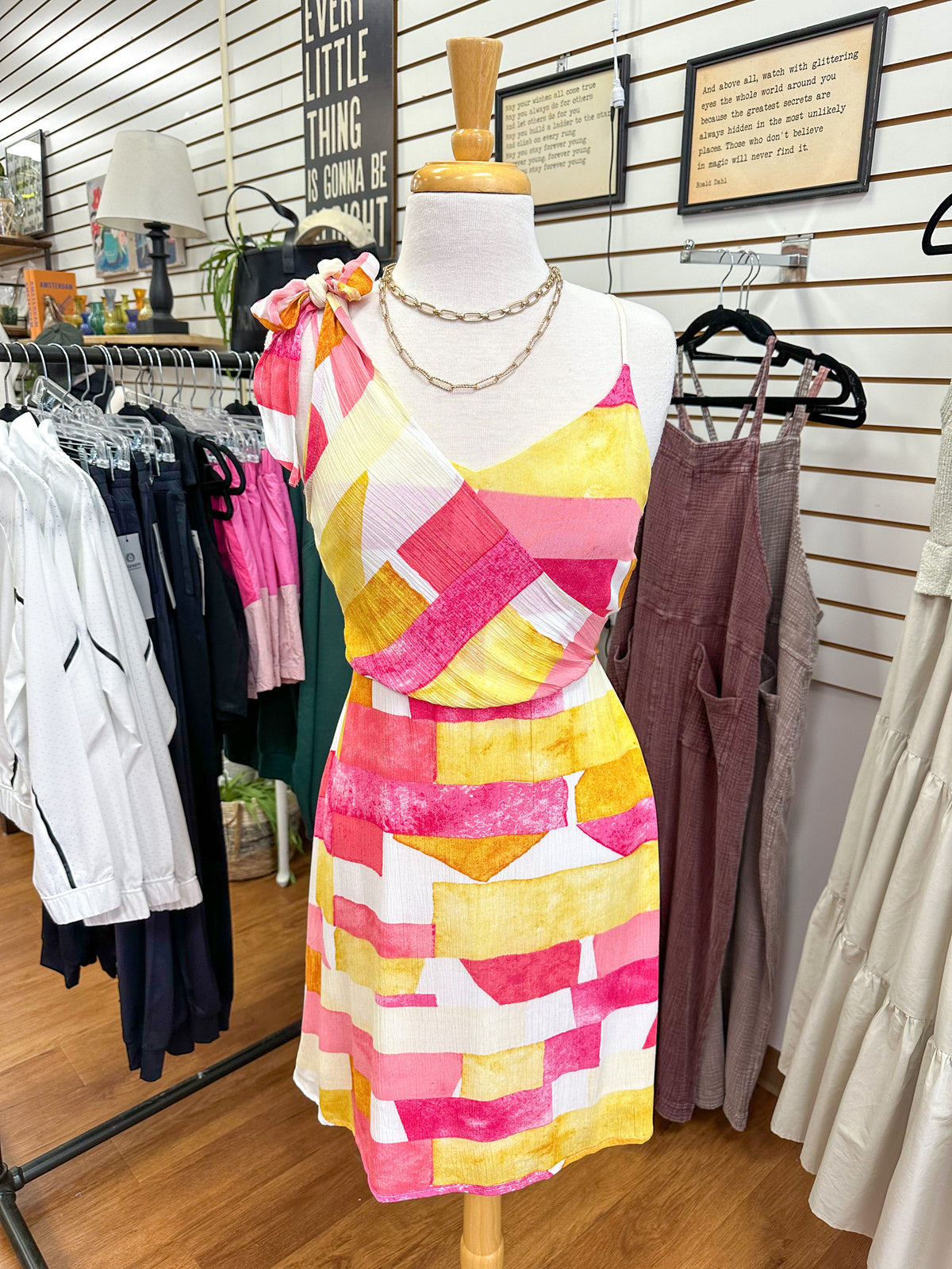 pink and yellow print tie shoulder dress